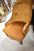 A Victorian button back nursing chair with later dralon upholstery