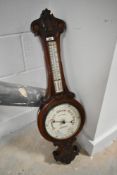 A 19th Century mahogany cased aneroid barometer, enamelled dial named for Pearce & Sons,