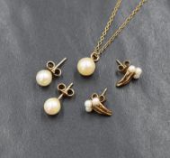A cultured pearl pendant on a 9ct gold chain with matched earrings and another pair of yellow gold