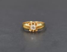 An early 20th Century 18ct gold signet ring having an old cut diamond, approx 0.25ct in a gypsy