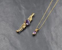 A 9ct gold bar brooch having central amethyst and foliate decoration, and a similar pendant and