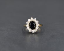 A 9ct gold sapphire and cubic zirconia cluster ring, size P/Q & approx 2.6g