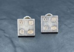 A pair of Sidney Beddall silver cufflinks, the square panels having hallmarks to each corner, 32g
