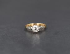 An 18ct gold diamond solitaire ring, the round brilliant cut diamond measuring approximately 0.50ct,