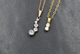 Two 9ct gold chains, 18' & 20'both having cubic zirconia pendants, aprox 2.2g total