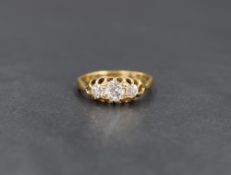 A Victorian three stone graduated diamond ring, the three old cut diamonds totalling approx 0.38ct