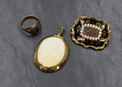 Three pieces of mourning jewellery including an Edwardian 9ct rose gold ring with plaited hair panel