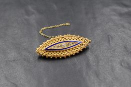 A 15ct gold locket brooch of lozenge form having nine graduated old cut diamonds, approx 0.5ct total