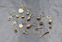 A selection of 9ct gold and yellow metal oddment and broken earrings, approx 6.5g