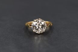 An 18ct gold 3ct diamond solitaire ring, the brilliant cut diamond measuring approximately 3ct in an