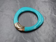 A Braybrook & Britten dark turquoise coloured resin and silver, shaped bangle, with box