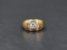 A yellow metal diamond set signet ring stamped 14K, the diamond being approx 0.5ct in a pave set