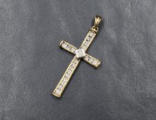 A 9ct gold diamond set cross pendant, the cross having an central diamond measuring approximately