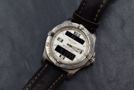 A Breitling Aerospace wristwatch, the pale dial having Arabic and baton numerals, with two digital