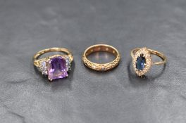 Three 9ct gold dress rings having non precious stones in three different designs, approx 7.4g gross
