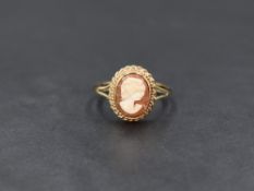 A 9ct gold cameo ring, the bezel set cameo depicting a maiden in profile with a twisted rope mount