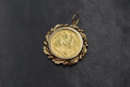 A Victorian 1893 sovereign, in a 9ct gold oak leaf and acorn motif mount, 11.7g