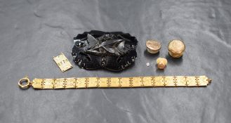 A small selection of jewellery including a loose diamond, 0.1ct, a gold plated articulated bracelet,