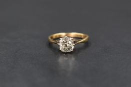 An 18ct gold 1ct diamond solitaire, the old cushion cut diamond measuring approximately 1ct in an