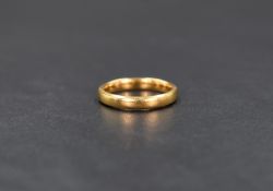 A 22ct gold band, of plain form, ring size J, 4.1g