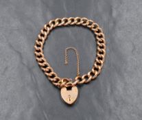 A 9ct rose gold curb link bracelet having padlock clasp, safety chain broken, approx 200mm long &