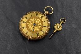 An 18ct gold open face key wound pocket watch, the golden dial having Roman numerals and floral
