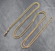 A yellow metal muff chain bearing plaque stamped 9ct, approx 58' & 29.8g
