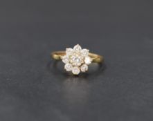 A 9ct gold cubic zirconia cluster ring, the floral motif cluster, ring size J, 1.4g