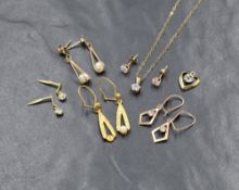 A 9ct gold chain with cubic zirconia solitaire pendant , matching earrings and similar heart