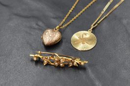 A yellow metal seed pearl bar brooch, the floral motif bar brooch set with seed pearls, along with a