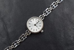 A lady's silver wrist watch by Sekonda having baton dial to silvered face in a plain circular case