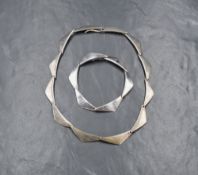 A Hans Hansen silver boomerang necklace and bracelet set, having hook closures, 45.3g gross