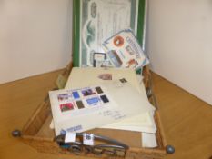 WORLDWIDE STAMPS AND OTHER PAPER EPHEMERA IN BASKET Interesting collection of various leaves packets