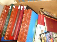 WORLDWIDE STAMP COLLECTIONS IN 17 VOLUMES MINT AND USED Hefty world collections in old fruit box, 17