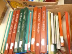 WORLDWIDE STAMP COLLECTIONS IN 17 VOLUMES MINT AND USED Hefty world collections in old fruit box, 17