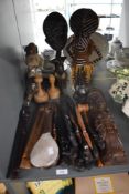 A pair of carved hardwood hand sculptures having lobed bases, h19cm, sold together with a group of