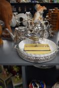 A silver plated tea service, to include candelabra, Bishton spoons, ceramic cake dish ect, ( 17 ).