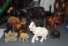 A large group of wooden elephants, to include a pair of resin elephants ect, ( 19 ).