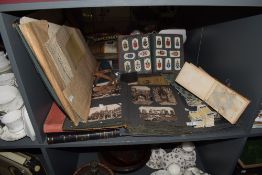 A large collection of various post cards, pictures cards and photo albums ect.