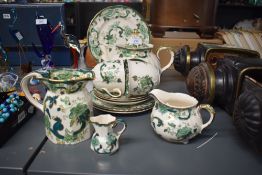 A Mason's Chartreuse pattern tea service, decorated having green foliage and gilt edging on a
