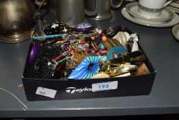 A collection of earrings, including clip-on and those for pierced ears, wooden examples, statement