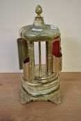 A vintage green onyx music box having a revolving dispenser section, h27cm