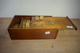 A Chinese Mah-jongg game set, complete with slide to box, paper label to base, w27.5