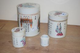 A group of 19th century famille rose porcelain lidded storage pots, beautifully hand coloured with
