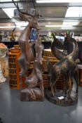 An African sculpture hand cared from afrormosia wood depicting mother deer feeding faun, h43cm, sold