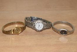Three ladies watches, to include a Timex Quartz, a Constant Quartz and a Sekonda.