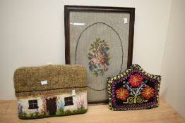 A vintage serving tray decorated having handmade floral needlepoint work encased within an oak