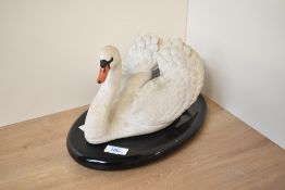 A Royal Swan fine bisque porcelain figurine on oval mahogany base, h18cm