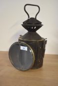 An antique railway aspect hand signal lantern having corrugated body, fitted inside with red and bl