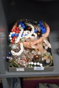 An assortment of costume necklaces, including beaded examples, statement pieces and faux pearls,
